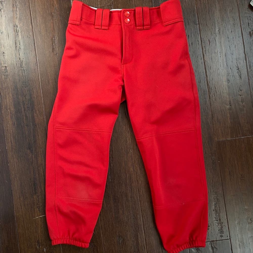 Red Mizuno fast pitch softball pants